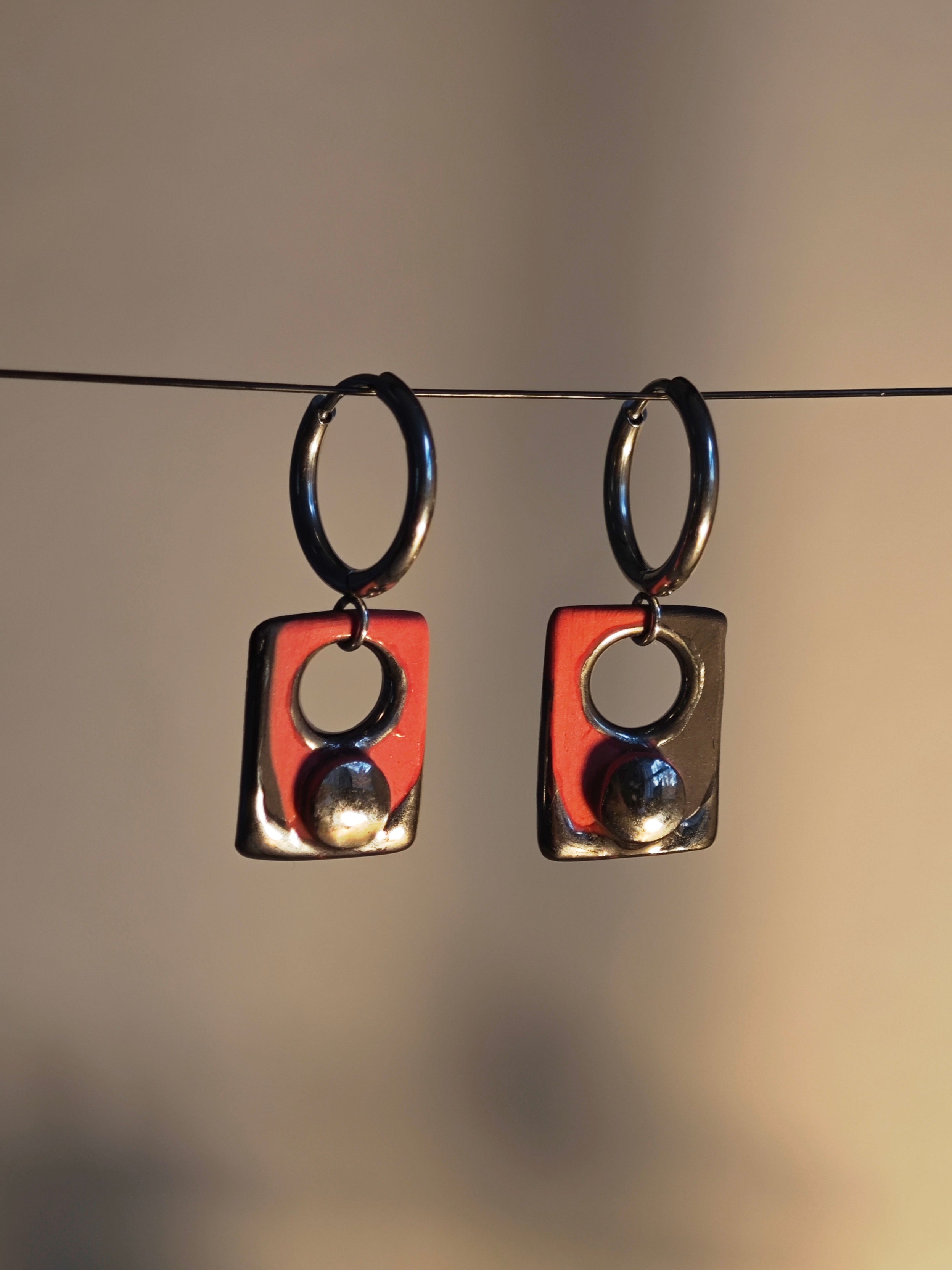 press the button earrings